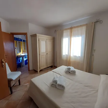 호텔 Il Faro Di Molara 4*
